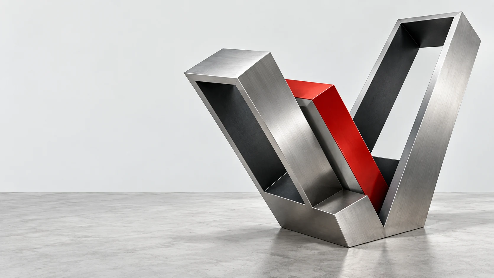Sculptural V assembled from brushed metal frames and a red structural core.